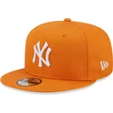 new-era-flat-brim-9fifty-league-essential-new-york-yankees-mlb-orange-snapback-cap