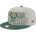 czapka-z-plaskim-daszkiem-szaro-zielona-snapback-9fifty-draft-edition-2023-milwaukee-bucks-nba-od-new-era