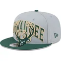 gorra-plana-gris-y-verde-snapback-9fifty-tip-off-2023-de-milwaukee-bucks-nba-de-new-era