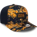 gorra-curva-naranja-y-azul-marino-snapback-9fifty-all-over-print-de-red-bull-racing-formula-1-de-new-era