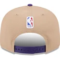 cappello-piatto-marrone-e-viola-snapback-9fifty-draft-2024-dei-los-angeles-lakers-nba-di-new-era