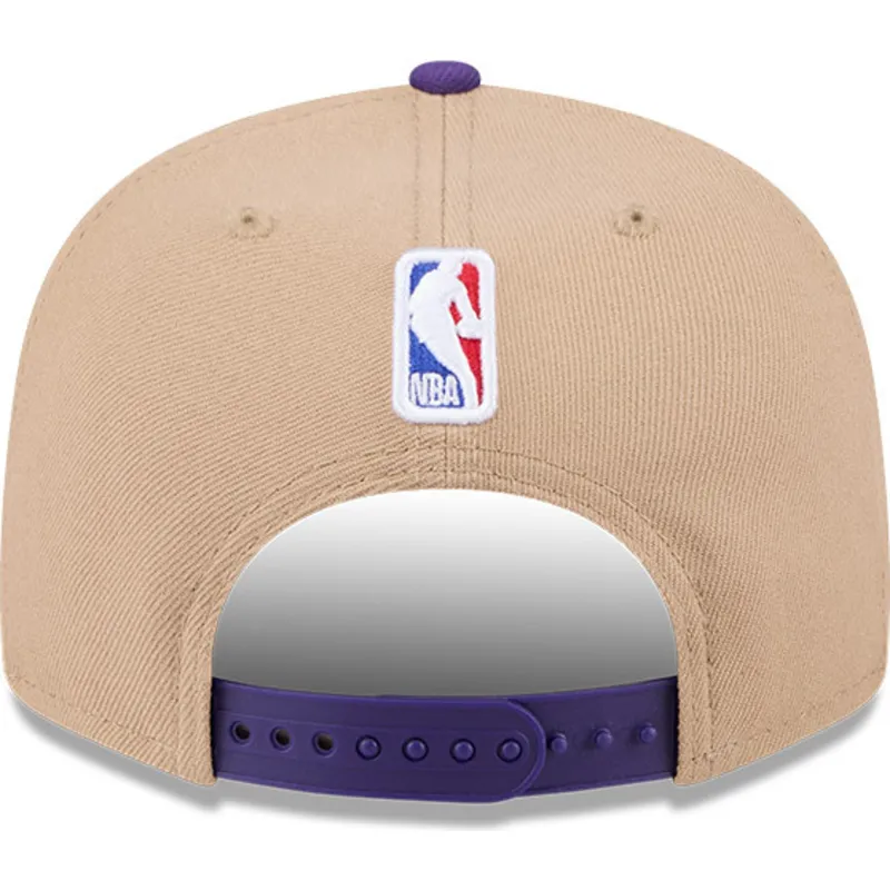 cappello-piatto-marrone-e-viola-snapback-9fifty-draft-2024-dei-los-angeles-lakers-nba-di-new-era