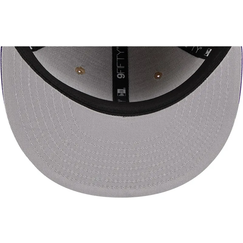 cappello-snapback-9fifty-draft-2024-dei-los-angeles-lakers-nba-di-new-era-marrone-e-viola