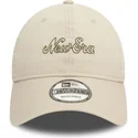 new-era-curved-brim-9twenty-heritage-script-beige-adjustable-cap