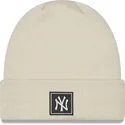 gorro-beige-team-cuff-de-new-york-yankees-mlb-de-new-era