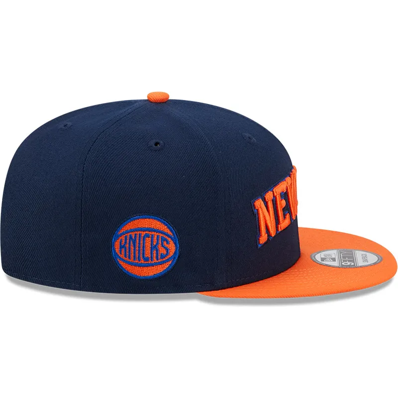 cappello-piatto-blu-marino-e-arancione-snapback-9fifty-statement-dei-new-york-knicks-nba-di-new-era
