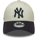 casquette-courbee-beige-et-bleue-marine-ajustable-9forty-side-script-new-york-yankees-mlb-new-era