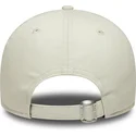 new-era-curved-brim-9forty-side-script-new-york-yankees-mlb-beige-and-navy-blue-adjustable-cap