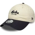 casquette-courbee-beige-et-bleue-marine-ajustable-pour-femme-9twenty-new-era