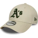 beige-justerbar-keps-med-bojd-skarm-och-gront-logo-9forty-league-essential-oakland-athletics-mlb-fran-new-era