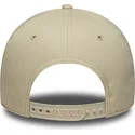 beige-gebogene-snapback-kappe-9forty-e-frame-side-patch-der-new-york-yankees-mlb-von-new-era