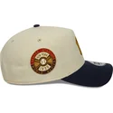 casquette-courbee-beige-et-bleue-marine-snapback-9forty-e-frame-world-series-patch-new-york-yankees-mlb-new-era