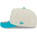 gorra-curva-beige-y-azul-snapback-9fifty-a-frame-precurved-hardwood-classics-de-charlotte-hornets-nba-de-new-era
