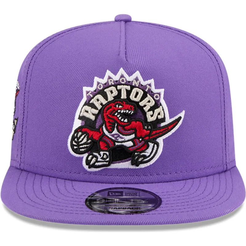 cappellino-piatto-viola-snapback-9fifty-a-frame-hardwood-classics-dei-toronto-raptors-nba-di-new-era