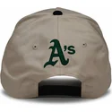 gorra-curva-beige-y-negra-snapback-rise-structured-de-oakland-athletics-mlb-de-nike