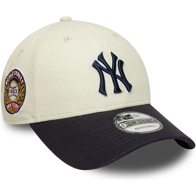 beige-und-marineblaue-verstellbare-curved-cap-mit-marineblauen-logo-9forty-world-series-der-new-york-yankees-mlb-von-new-era