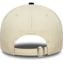 gebogene-beige-und-schwarze-verstellbare-kappe-9twenty-wash-distress-a-frame-von-new-era