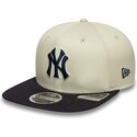 casquette-plate-beige-snapback-avec-logo-bleu-marine-9fifty-original-fit-world-series-new-york-yankees-mlb-new-era